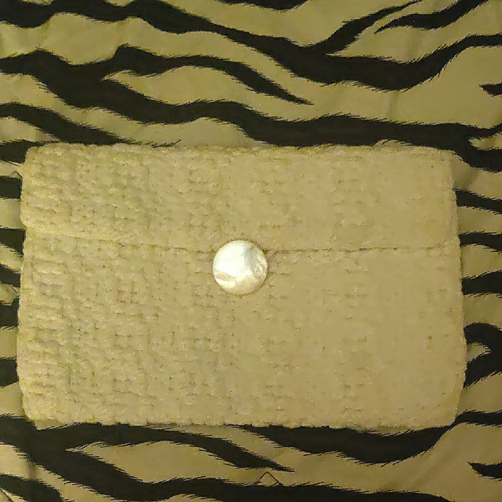Elegant White Woven Clutch Purse with Mother of Pearl Button closure.